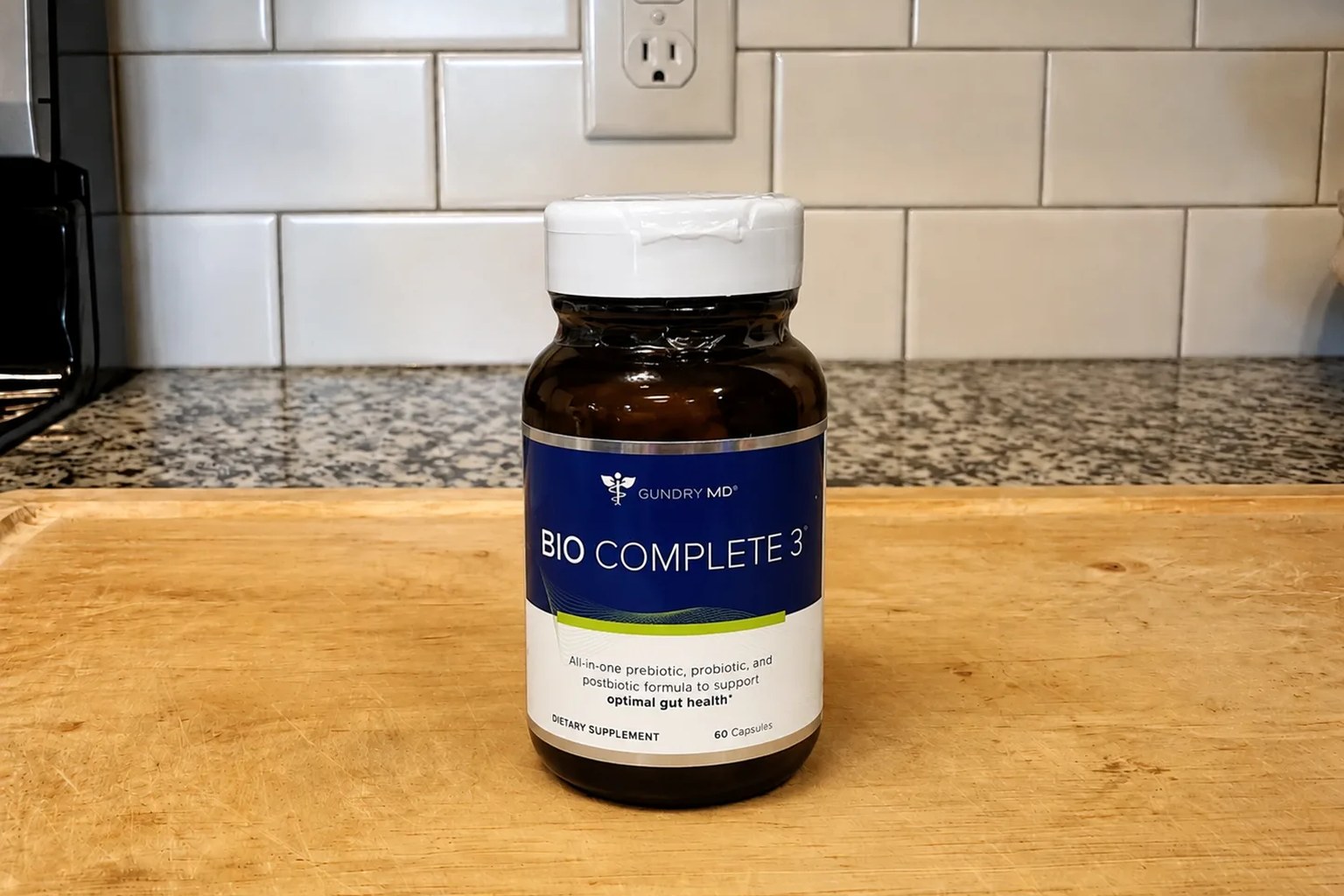 A Bio Complete 3 bottle by Gundry MD on our kitchen counter, 60-capsule, 30-serving supply