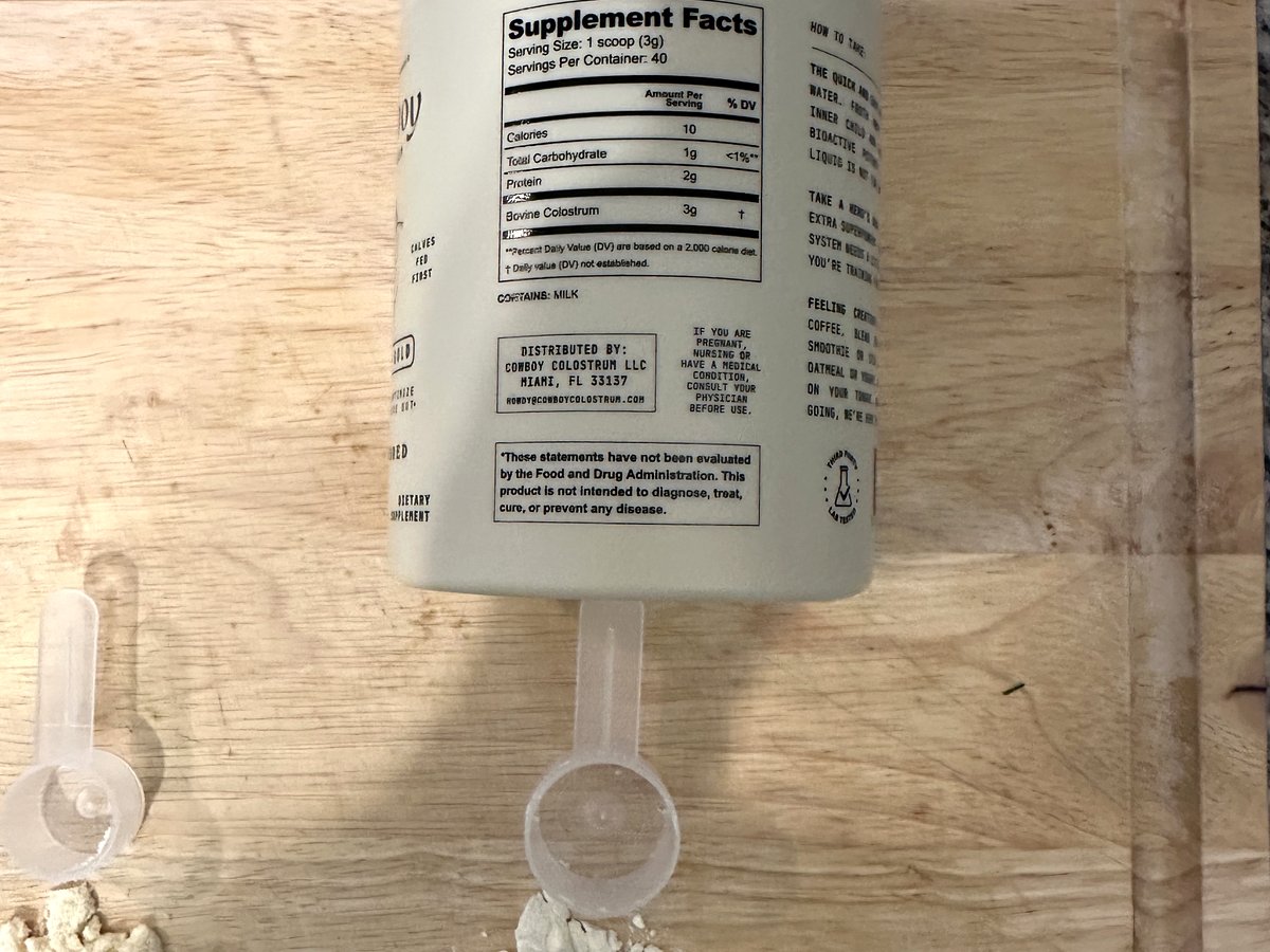 Cowboy Colostrum Nature's Gold Supplement Facts label: serving size 1 scoop (3 g), 40 servings per container, 10 calories, 1 g carbohydrate, 2 g protein, 3 g bovine colostrum, contains milk