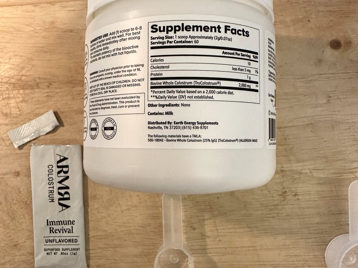 Earth Energy Pure Bovine Colostrum Supplement Facts label: 1 scoop approximately 2 g, 60 servings, 2,000 mg Bovine Whole Colostrum (TruColostrum), 25% IgG TMLA, contains milk
