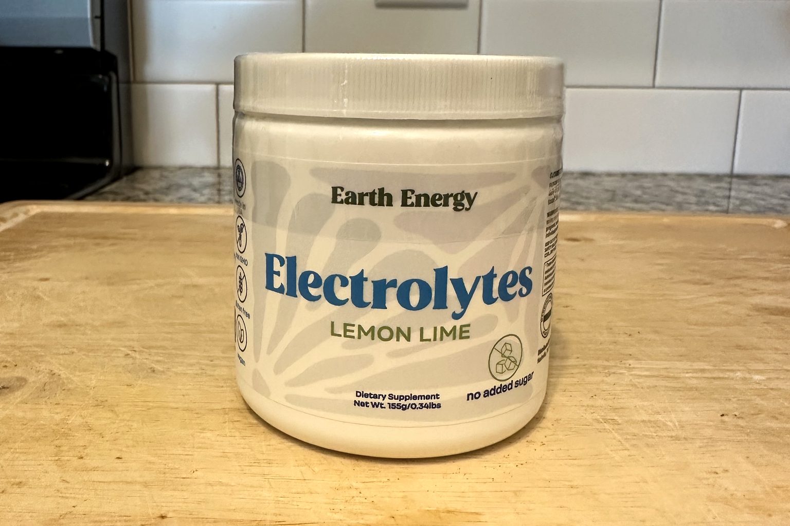 The Earth Energy Daily Hydration Lemon Lime jar we purchased, photographed on a kitchen counter