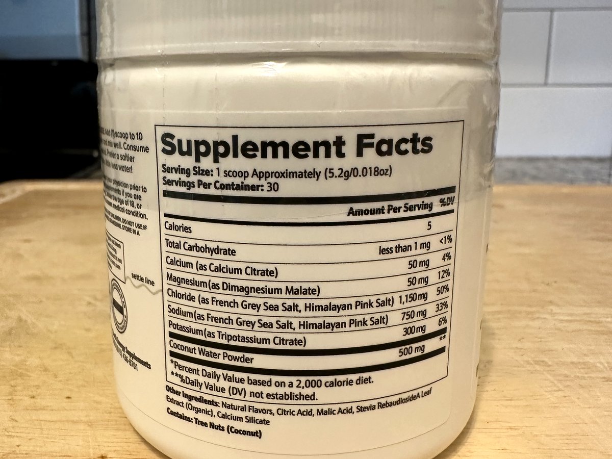 Earth Energy Daily Hydration Supplement Facts label: 1 scoop approximately 5.2 g, 30 servings, sodium 750 mg, chloride 1,150 mg, potassium 300 mg, magnesium 50 mg, calcium 50 mg, coconut water powder 500 mg, contains tree nuts (coconut)