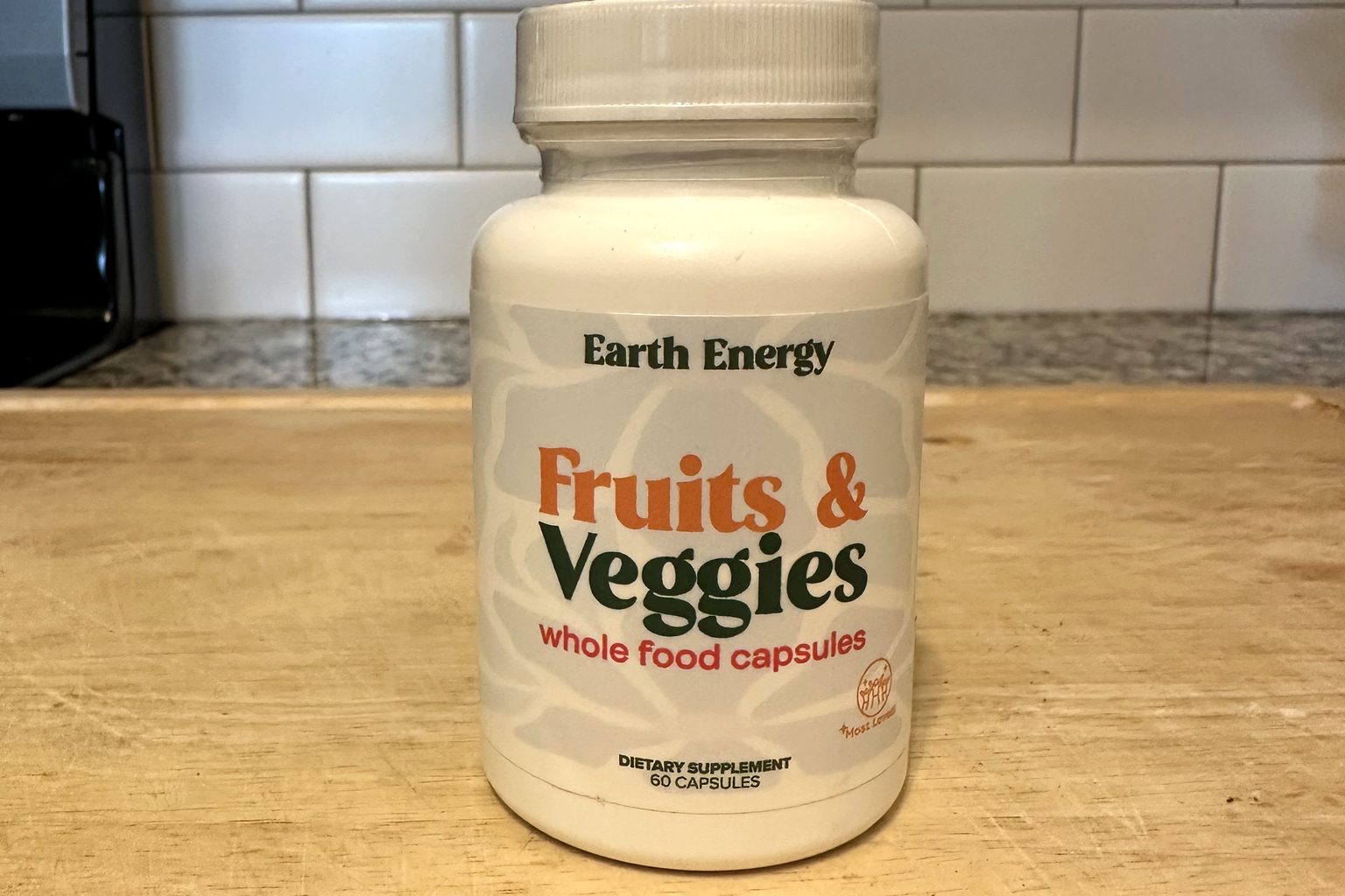 The Earth Energy Fruits & Veggies bottle we purchased, photographed on a kitchen counter