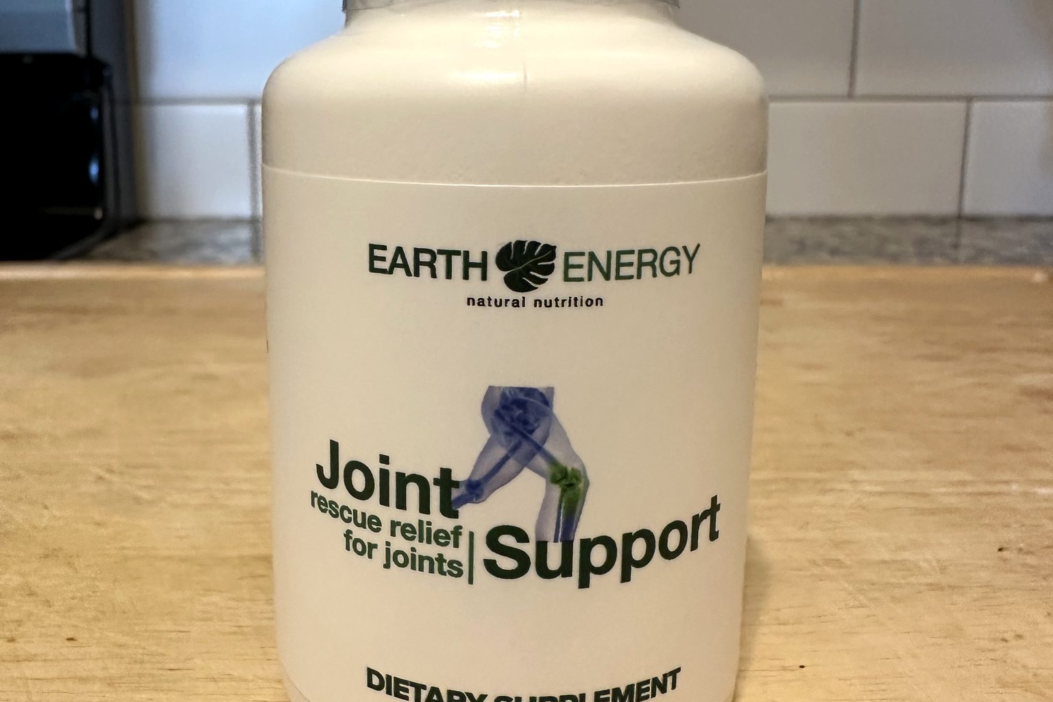 Earth Energy Joint Support bottle on our kitchen counter — rescue relief for joints, 60 capsules