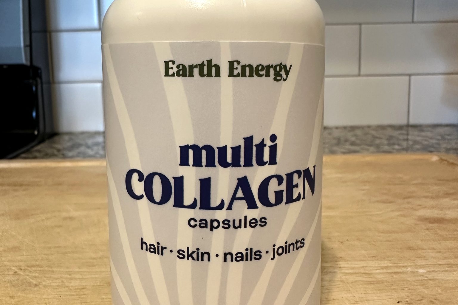 Earth Energy Multi Collagen Capsules bottle on our kitchen counter — 120 capsules, hair, skin, nails, joints