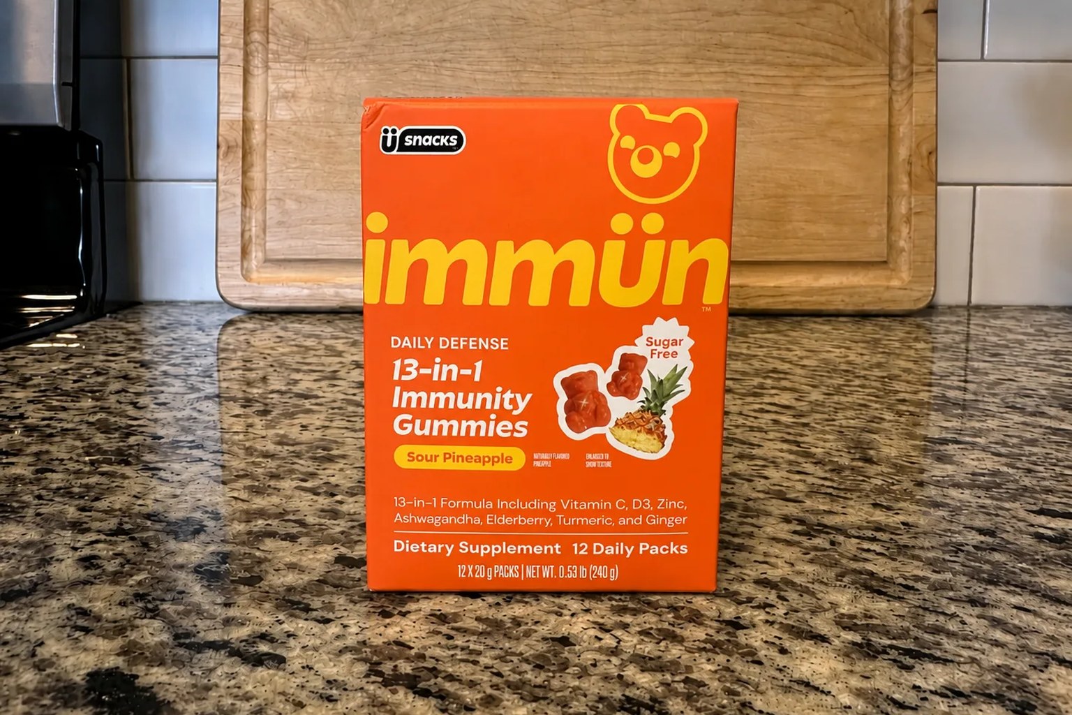 An imm&uuml;n 13-in-1 Immunity Gummies 12-pack box on our kitchen counter, Sour Pineapple, sugar free