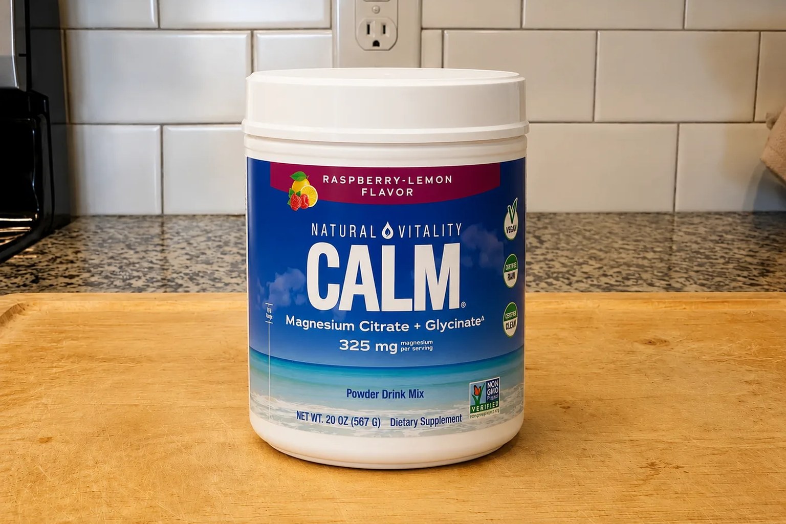A canister of Natural Vitality Calm magnesium drink mix on our kitchen counter, 16 oz