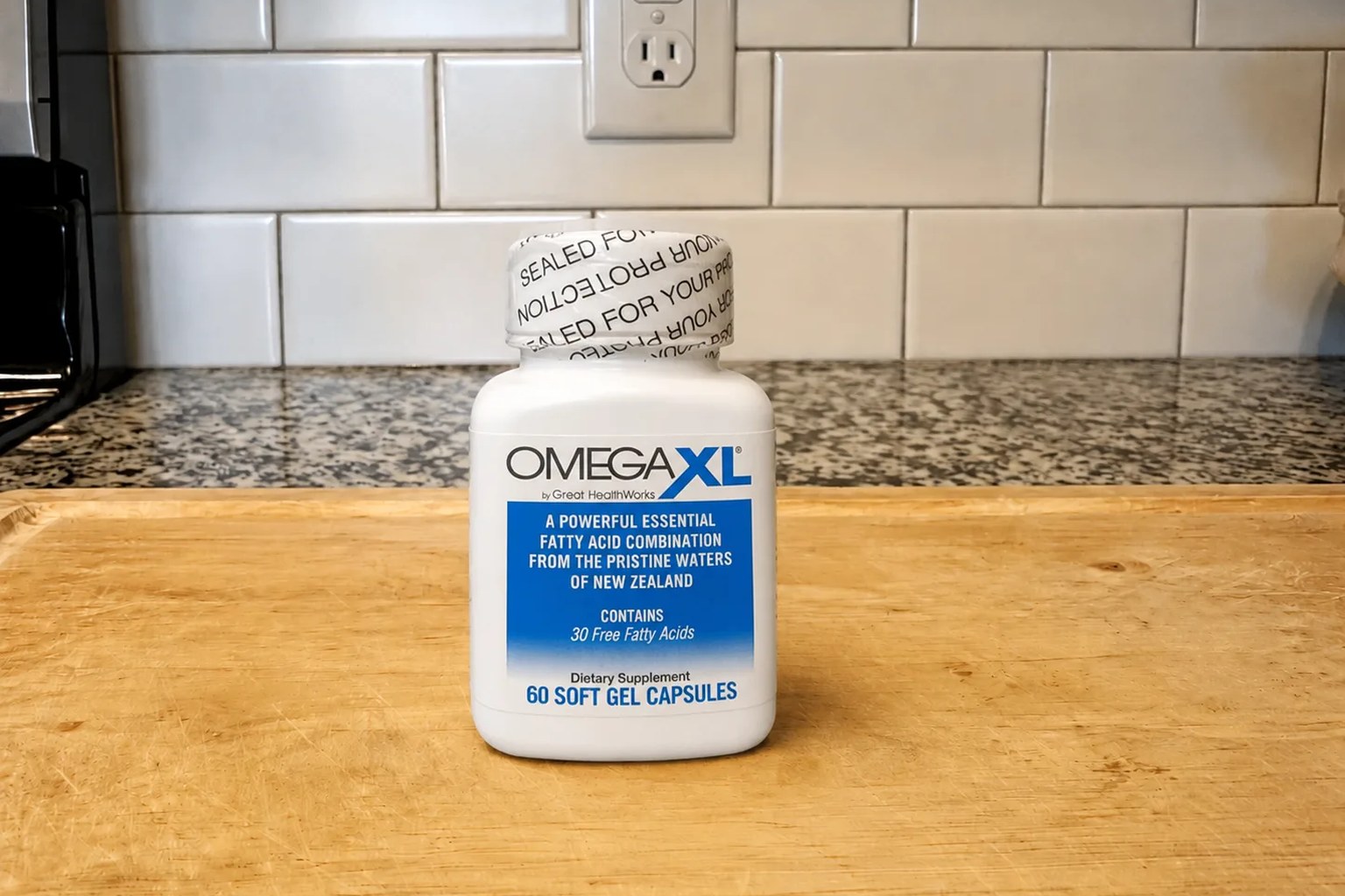 An OmegaXL bottle by Great HealthWorks on our kitchen counter, 60-softgel, 30-serving supply