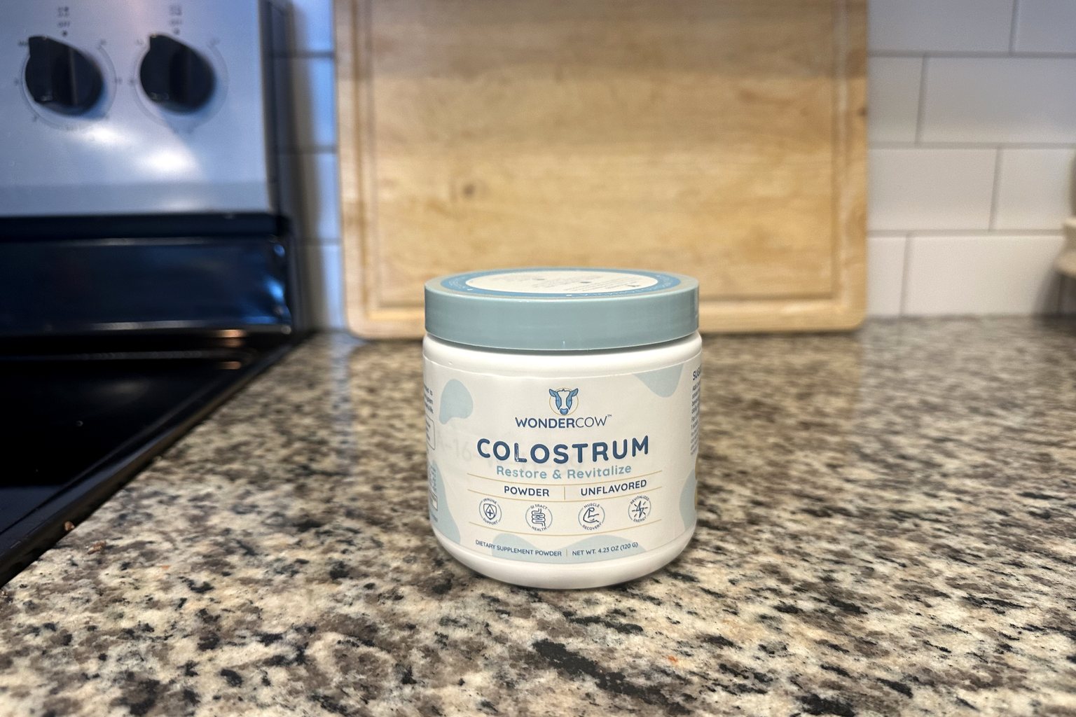 WonderCow Colostrum unflavored jar on our kitchen counter